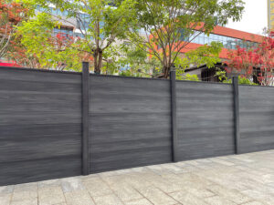 Splinter-free WPC fence surface safe for children and pets — smooth texture unlike weathered wood