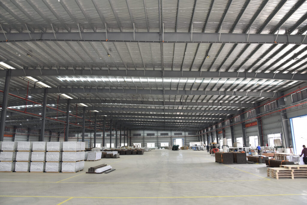 MecoFence factory warehouse demonstrating **massive inventory capacity** for **bulk purchasing** and **container-load supply** to wholesalers and constructors.