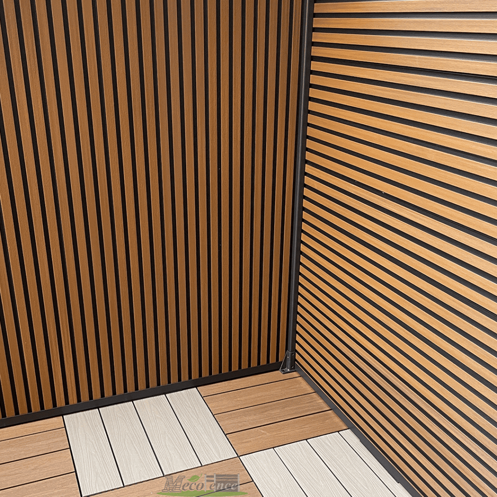 Detailed view of Mecofence dual tone composite fence corner post showing the secure connection between vertical and horizontal slat panels – modern aluminum frame construction for backyard privacy screens.