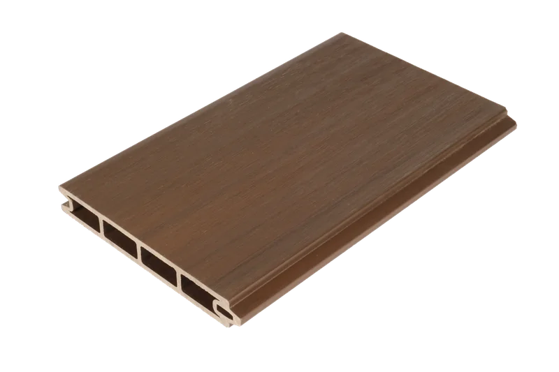 Walnut composite fence board showing woodgrain texture and hollow profile