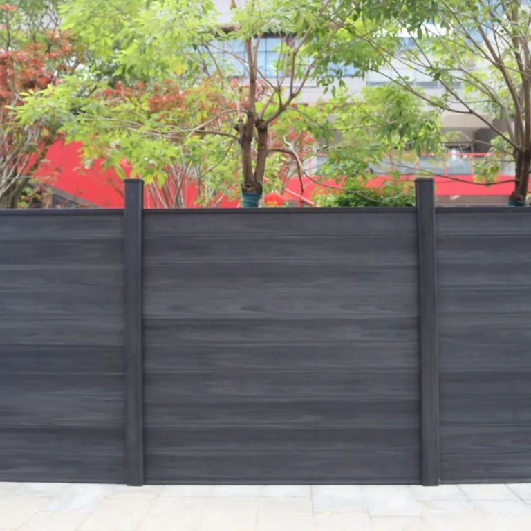 Dark grey privacy composite kit fence with colour-matched WPC posts and panels