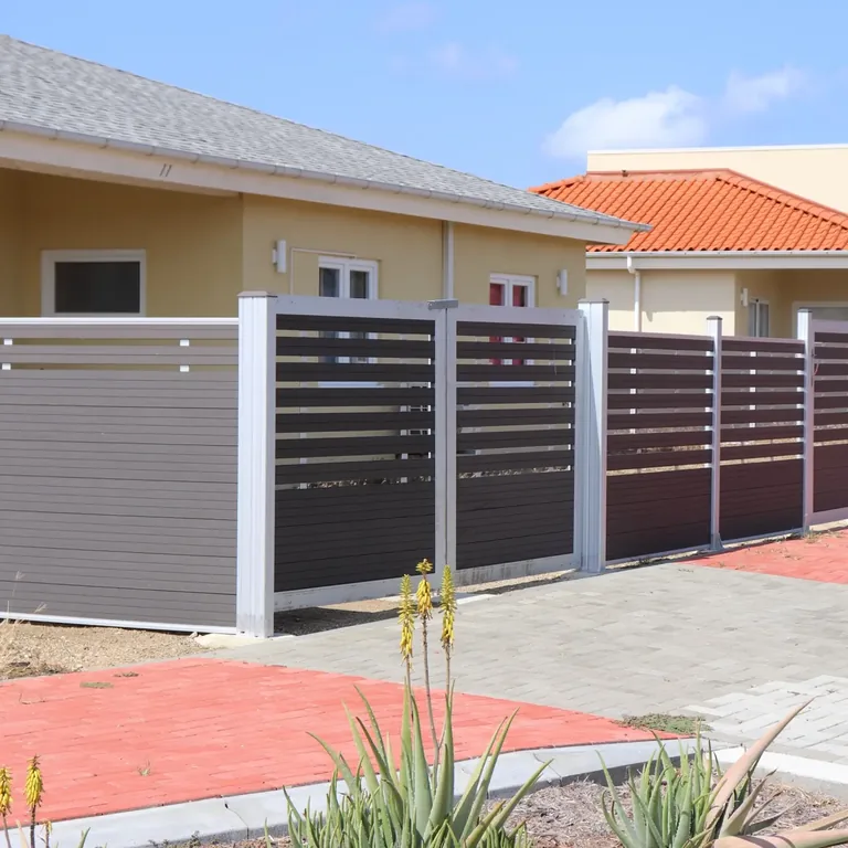 A MecoFence double swing gate shown with full-trellis infill