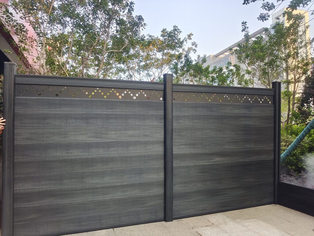 Finished installation of a MecoFence decorative composite screen, creating a stylish feature wall that filters light while maintaining backyard privacy.