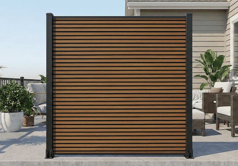 modern 6x6ft composite privacy fence panel featuring vertical boards, installed in a residential backyard in Canada.