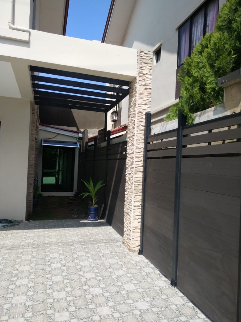 MecoFence composite fence and gate installed at a home in the Philippines, 2021