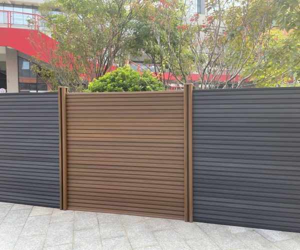 MecoFence Fluted Composite Fence Panel featuring a 3D vertical slatted texture. Modern WPC architectural cladding design with deep groove shadow lines.